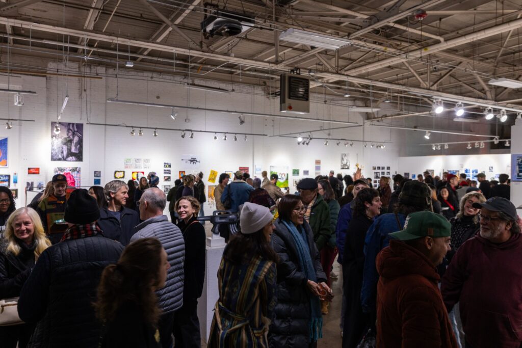 Image of audience in Goodyear Arts location viewing gallery show.